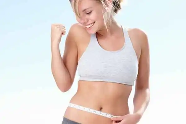 woman happy after fat reduction treatment Melton Mowbray