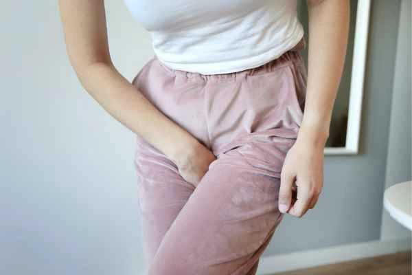 woman struggling with urine incontinence Melton Mowbray
